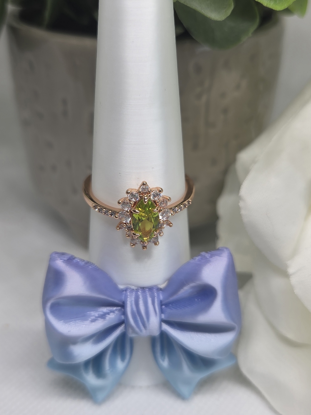 BP Rose Gold Peridot Halo Ring with Clear Accent Stones